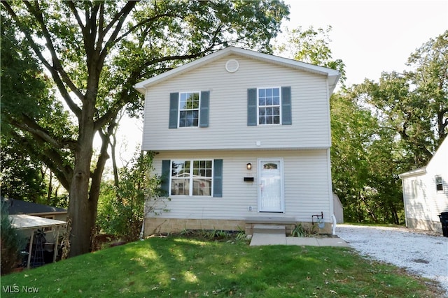 view of front of home with a front yard