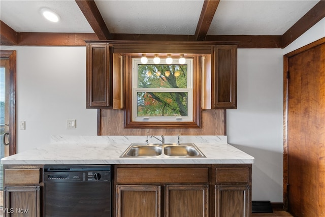 kitchen featuring black dishwasher, beamed ceiling, and sink