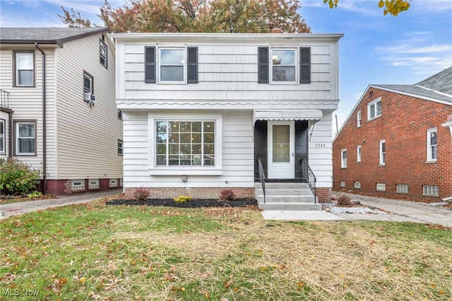 view of front of property with a front lawn