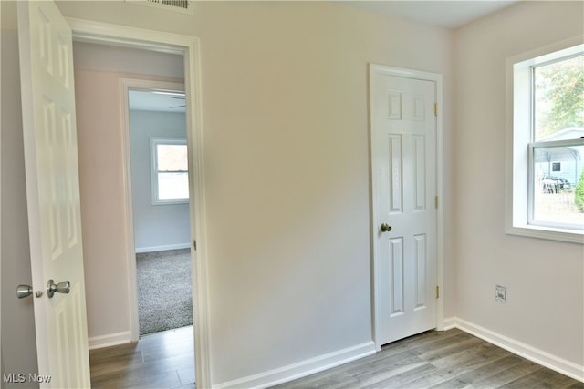 empty room with wood-type flooring