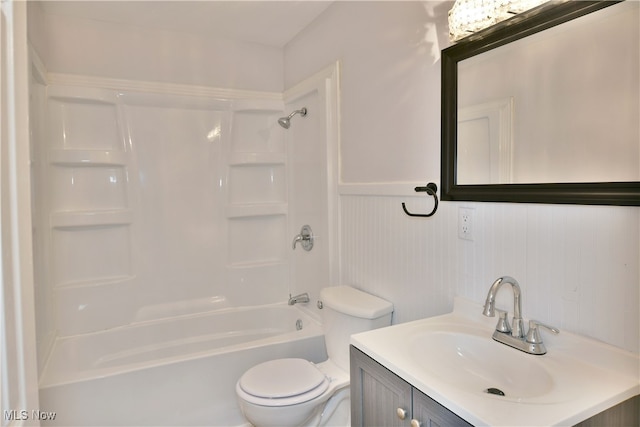 full bathroom featuring vanity, toilet, and shower / bathtub combination