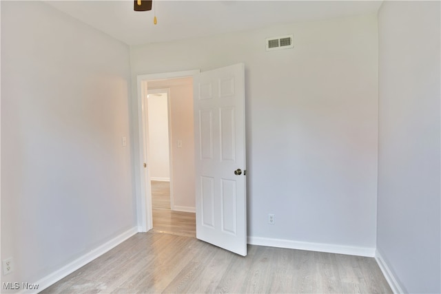 unfurnished room featuring light hardwood / wood-style floors