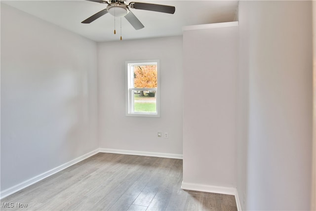 unfurnished room with light hardwood / wood-style flooring and ceiling fan