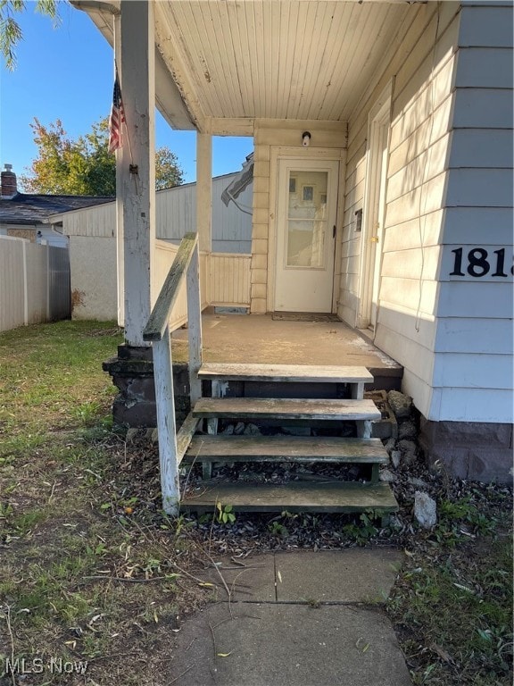 entrance to property with covered porch