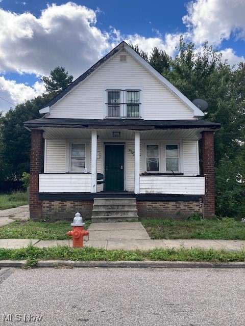 bungalow-style home featuring a porch