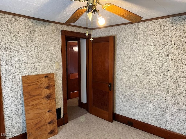 1208 N 4th St, Toronto, OH 43964 - spare room featuring ceiling fan, ornamental molding, light carpet, and baseboards