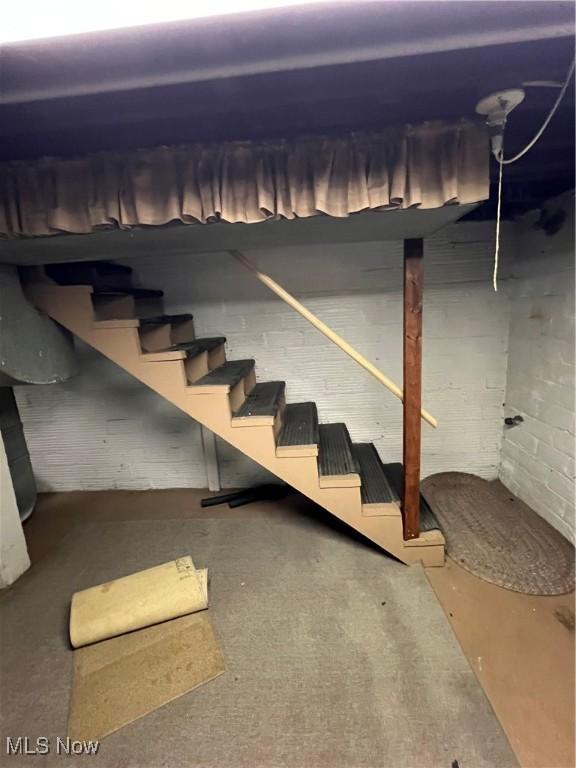 1208 N 4th St, Toronto, OH 43964 - below grade area with stairway and concrete block wall