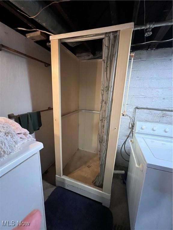 1208 N 4th St, Toronto, OH 43964 - bathroom with washer / dryer, a stall shower, vanity, and concrete flooring