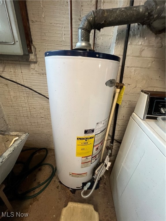 utility room with washer / dryer and gas water heater