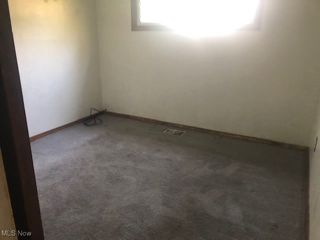 empty room with carpet floors