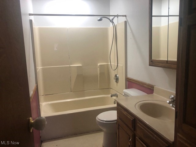 full bathroom with vanity, toilet, and tub / shower combination