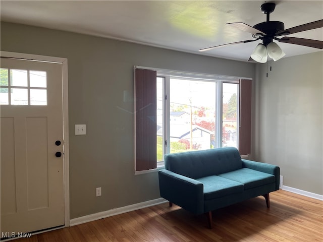 entryway featuring hardwood / wood-style flooring and ceiling fan