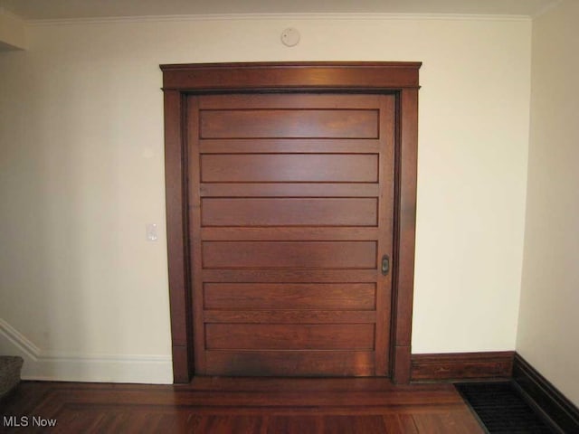 details with crown molding and wood-type flooring