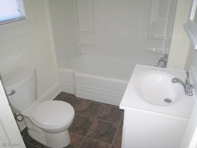 full bathroom with toilet, vanity, and  shower combination