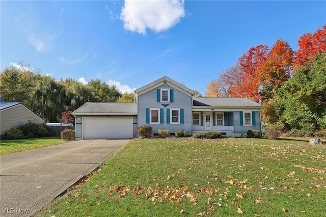 view of front of home featuring covered porch, a front lawn, and a garage