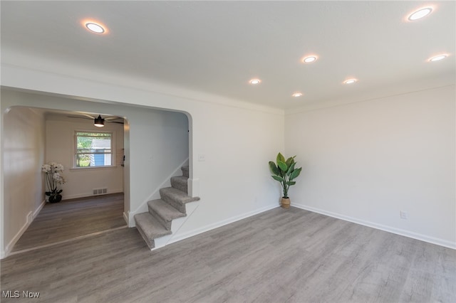 interior space with hardwood / wood-style flooring and ceiling fan