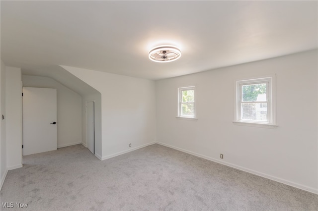 interior space featuring light colored carpet