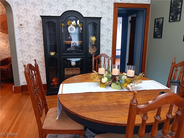 dining area featuring wood-type flooring