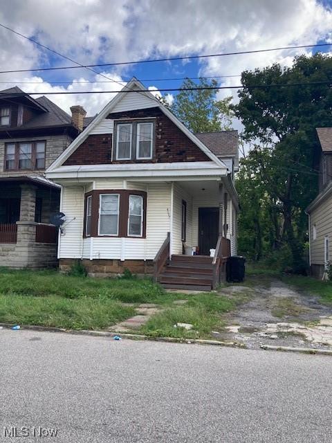 4157 E 123rd St, Cleveland, OH 44105 - bungalow-style home featuring a porch