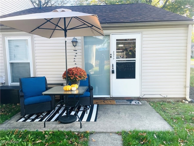 property entrance with a patio area