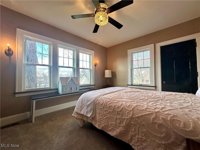 bedroom featuring ceiling fan and carpet floors