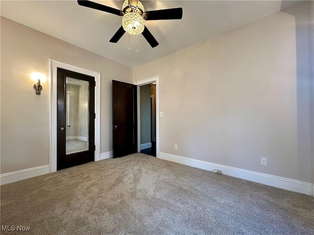 unfurnished bedroom featuring carpet flooring and ceiling fan