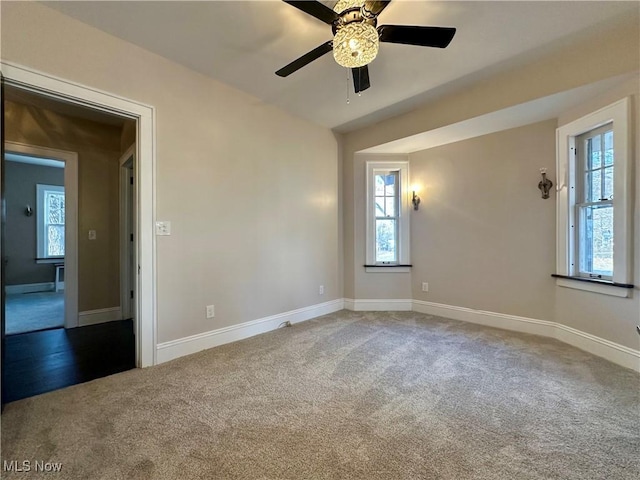 unfurnished room featuring carpet flooring and ceiling fan