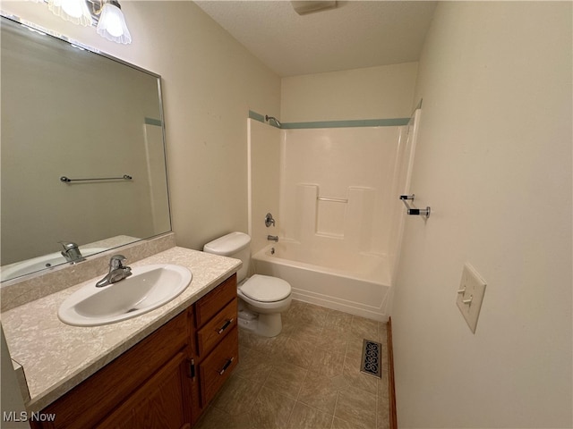 full bathroom featuring toilet, vanity, and bathing tub / shower combination