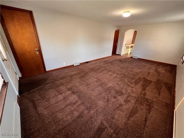 spare room with carpet floors