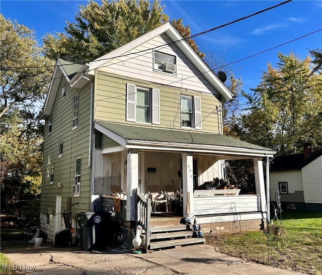 view of front property featuring a porch