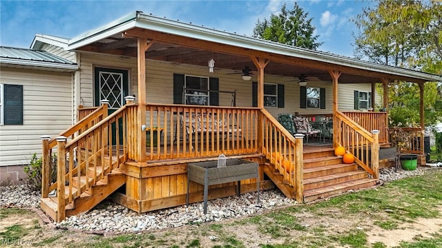 rear view of property with a porch