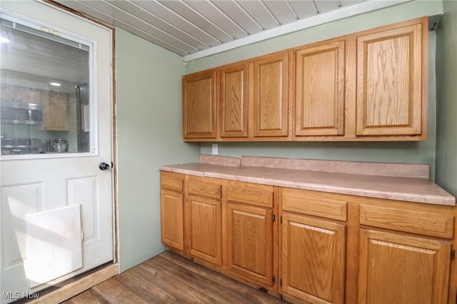 5057 Buchanan Rd, Waterford, OH 45786 - kitchen featuring light countertops, wood ceiling, and dark wood finished floors