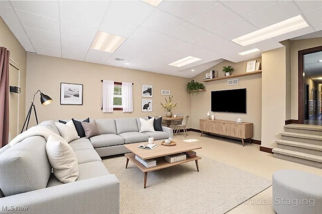 5057 Buchanan Rd, Waterford, OH 45786 - living room featuring baseboards, visible vents, vaulted ceiling, and a paneled ceiling