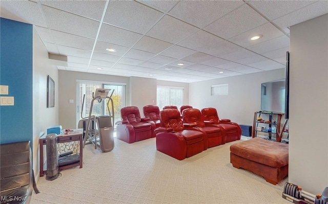 home theater with a paneled ceiling