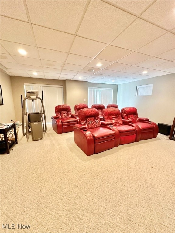 home theater with carpet and a drop ceiling