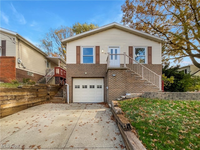 view of front of home with a garage