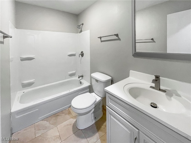 full bathroom featuring vanity, shower / washtub combination, toilet, and tile patterned floors