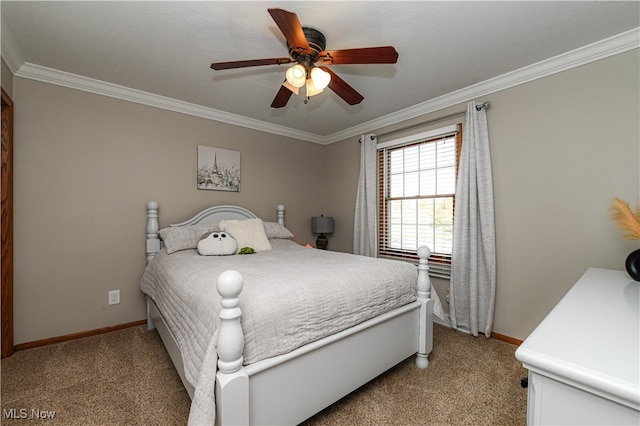 bedroom featuring ornamental molding, light colored carpet, and ceiling fan