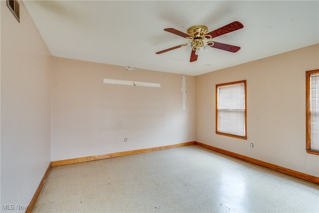 empty room featuring ceiling fan