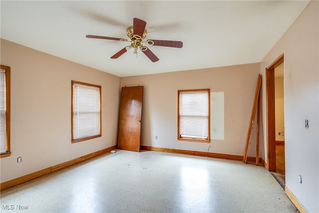 spare room featuring ceiling fan