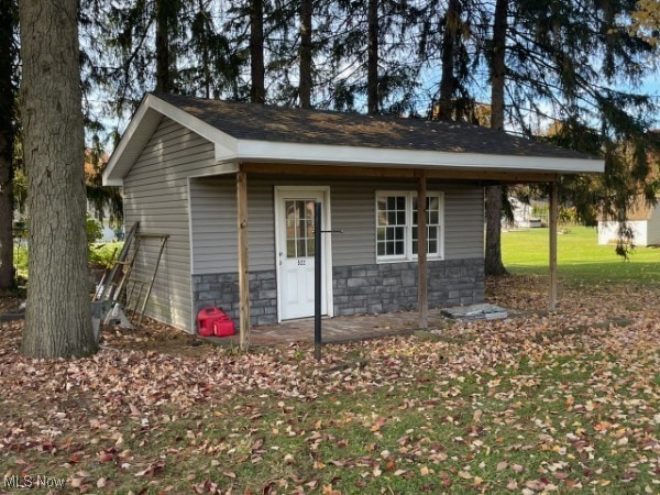 exterior space featuring a front lawn