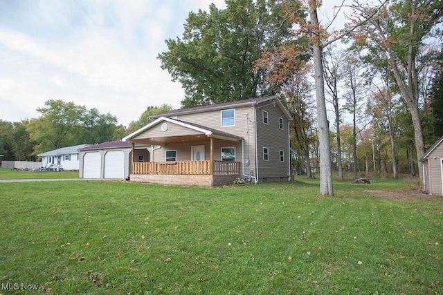 view of front of property featuring a porch, a garage, and a front lawn