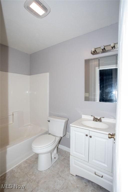 full bathroom with tile patterned floors, vanity, shower / bath combination, and toilet