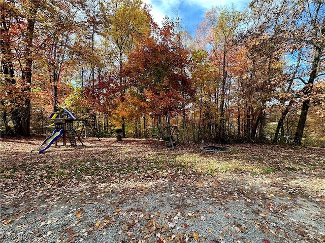 view of yard featuring a playground