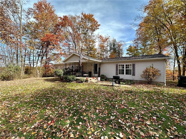 exterior space with a front yard