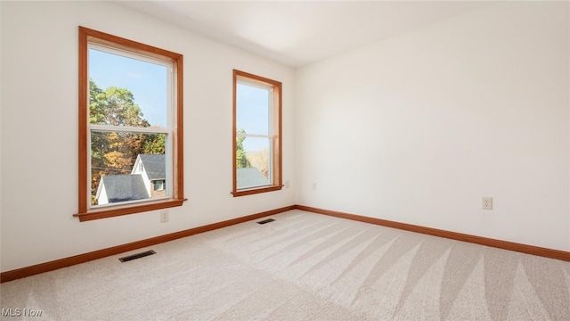 view of carpeted spare room