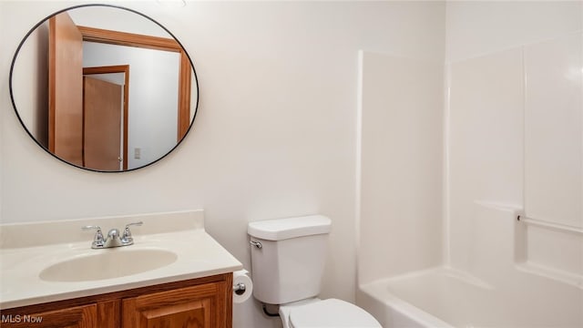 full bathroom with toilet, vanity, and  shower combination