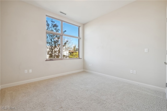 empty room featuring carpet flooring