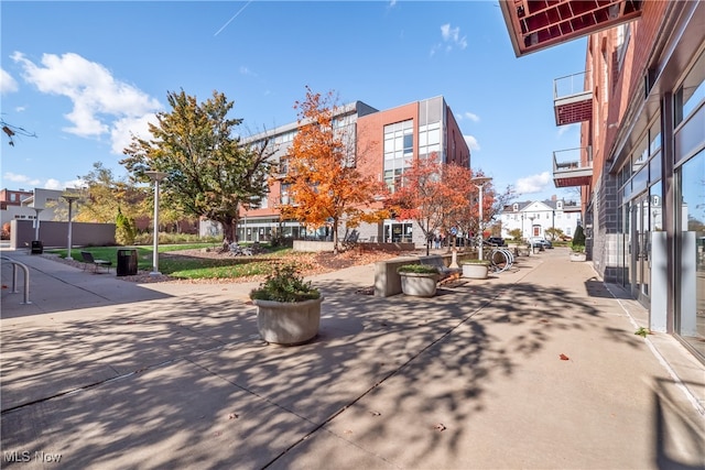 surrounding community featuring a patio area