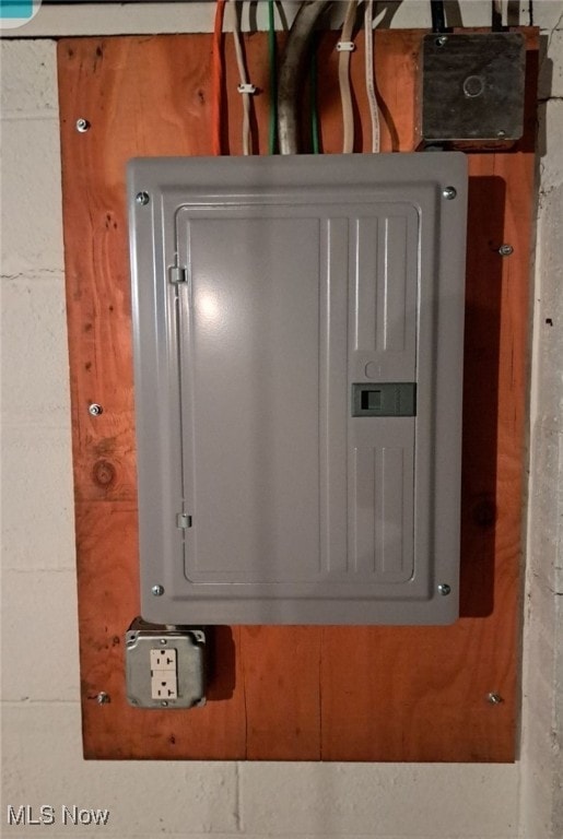 utility room featuring electric panel